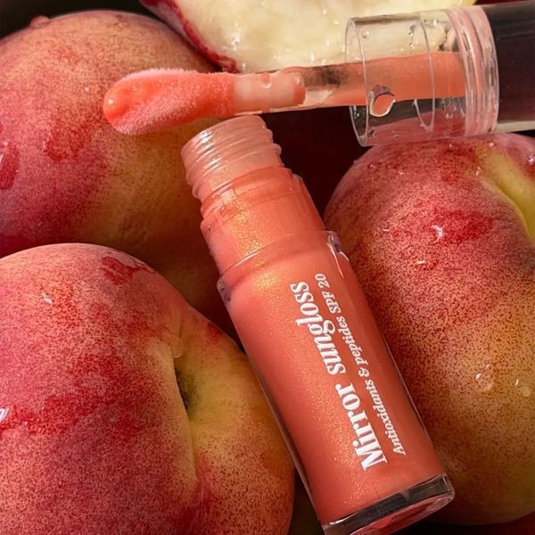 Hugs Mirror Sungloss Sparkling Bellini SPF 20+ PA++ Сонцезахисний блиск для губ, 5.5мл 2850 фото
